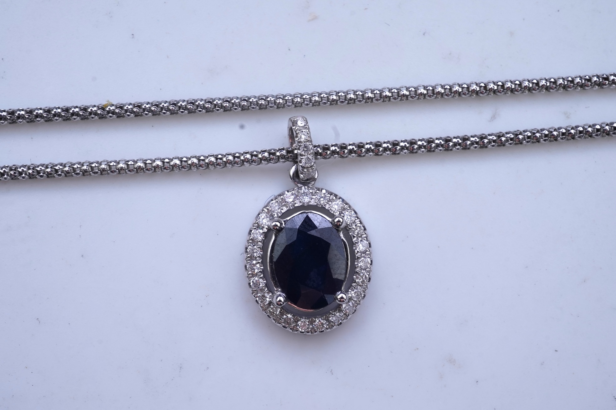 A sapphire and diamond demi-parure